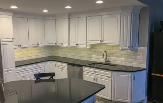 Kitchen renovation with white cabinets