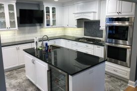 Kitchen remodel with island and TV